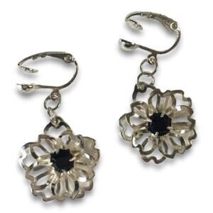 Delicate open work floral silver tone clip on earrings